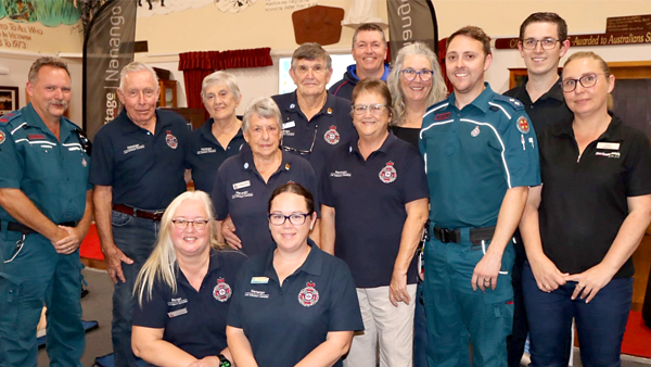 Group of people including paramedics and volunteers